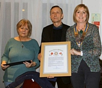 Sue and Terry Smith with The Rotary Club of Middleton President Sue Furby and their Rotary ‘Paul Harris Fellowship’ Award - 2015